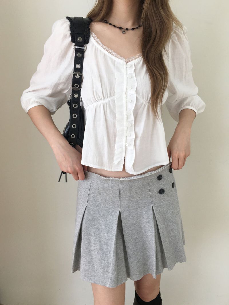 Low pleated sweat mini skirt