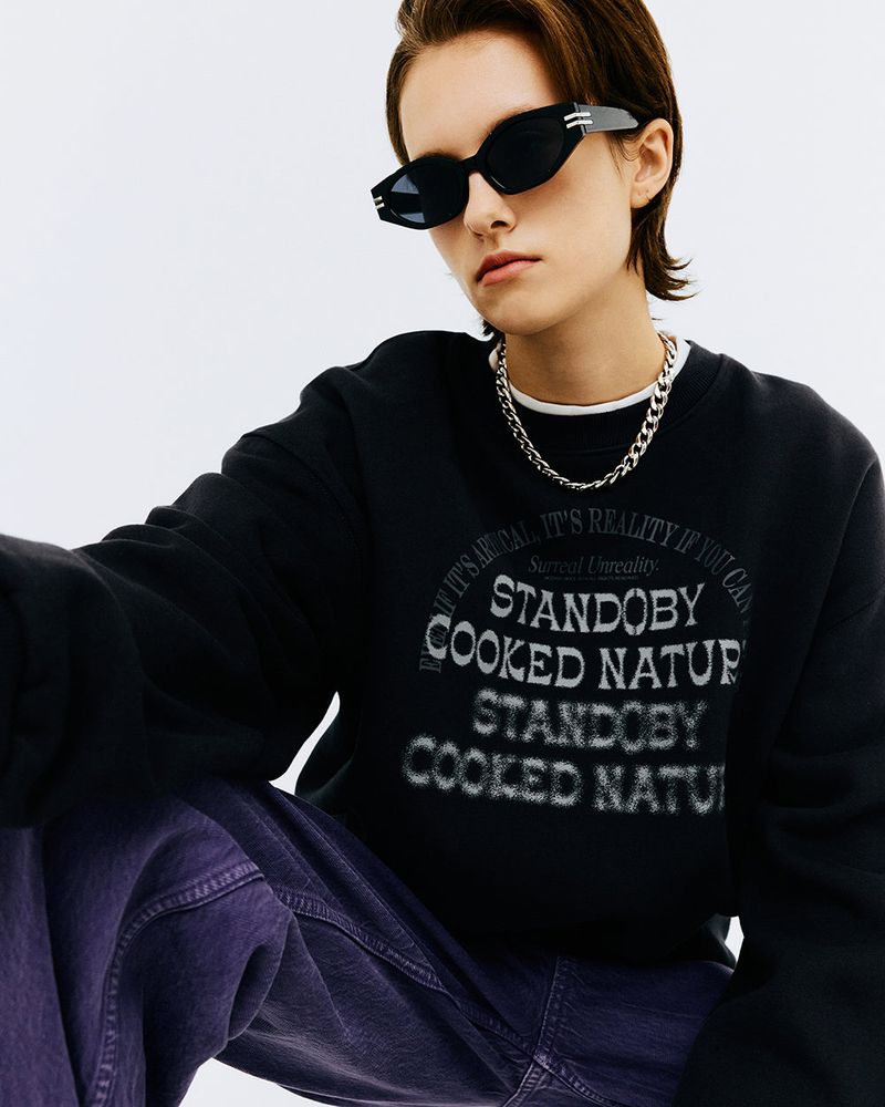 NCOVER(エンカバー)の「SPRAY ARCH LOGO CROP SWEATSHIRT-CHARCOAL(Tops)」