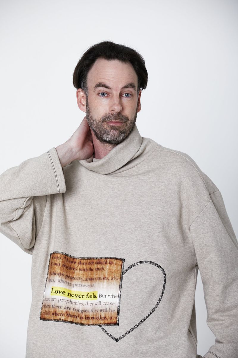 Love Never Fails Turtleneck