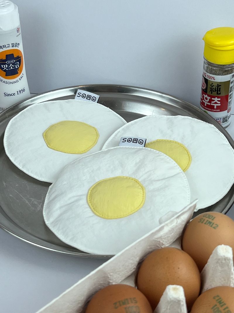 The weight of a fried egg