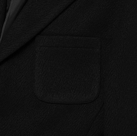 Crying medal over blazer