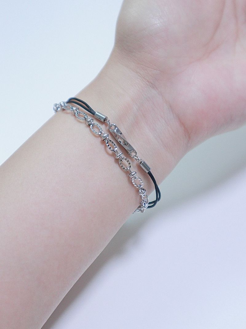 All surgical seel new wave layered string bracele