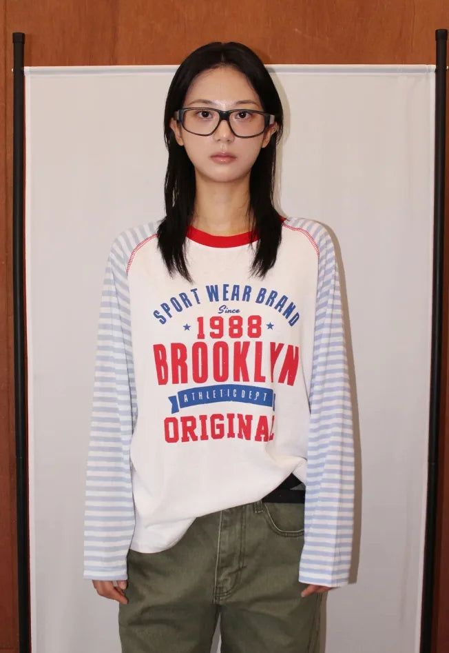 AAKE（アケ）の「BROOKLYN STRIPE RAGLAN TOP（Tops）」