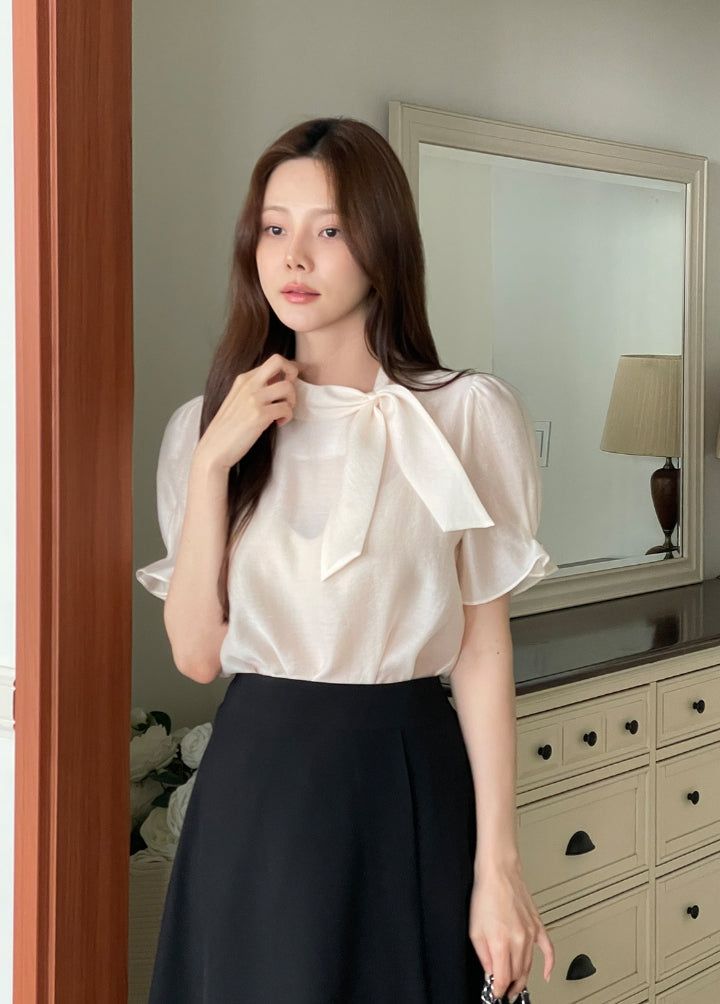 iam mari（アイアム マリ）の「Anne Tie Pearl Puff Short Sleeve Blouse（Tops）」
