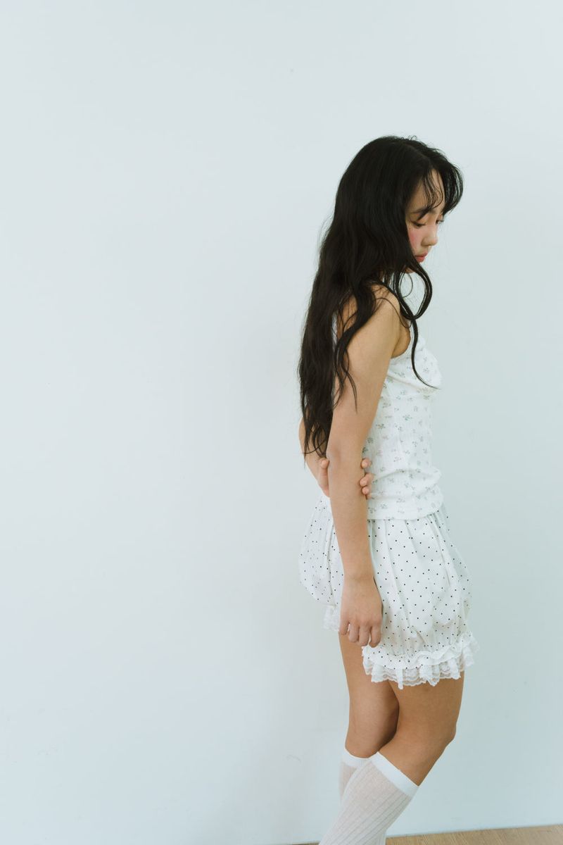 FLOWER EYELET LACE UP TOP
