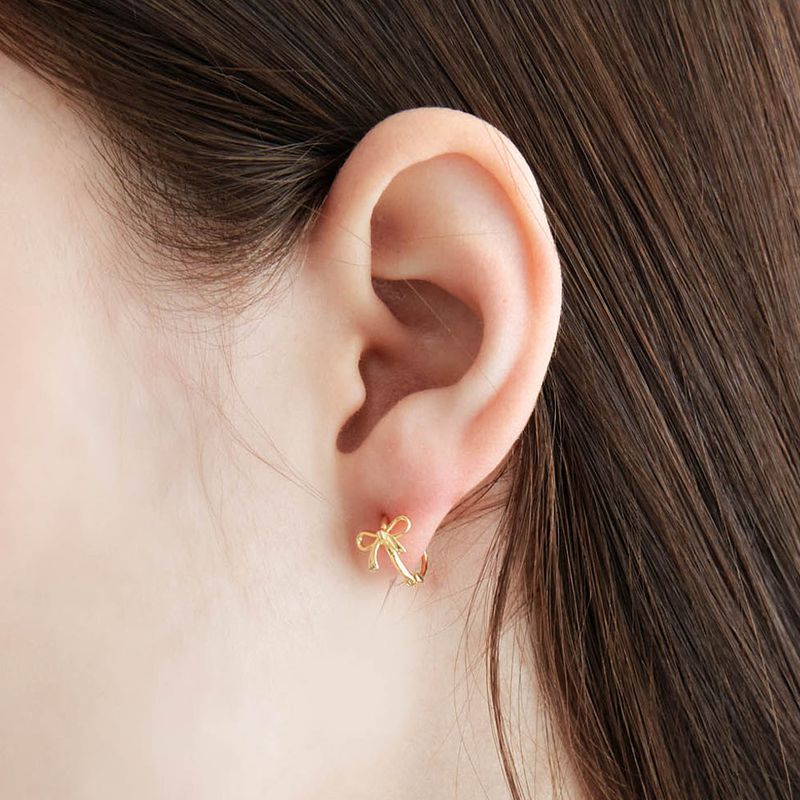 OVT-U（オーブイティーユー）の「ベイビーリボンワンタッチピアス（アクセサリー）」