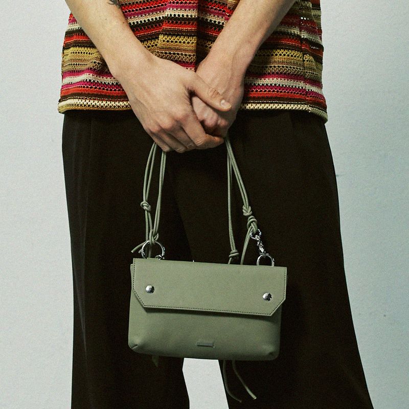 piping leather strap flap bag & utility key ring basil