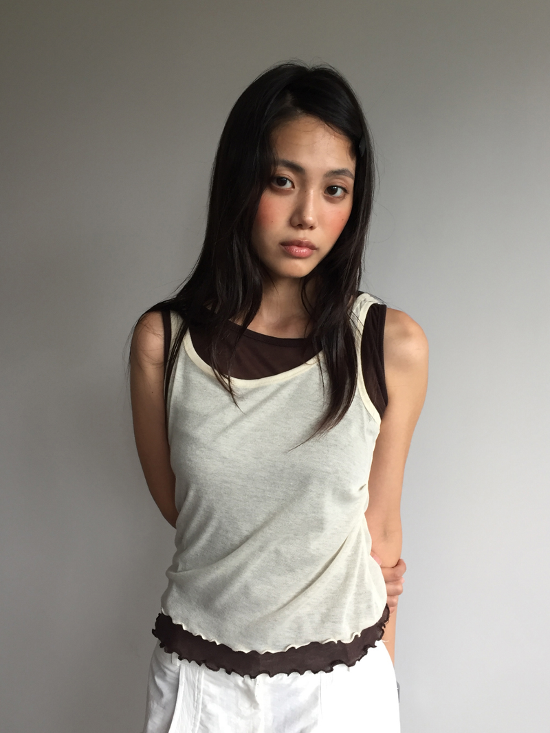 DUGGY(ダギー)の「Node frill layered sleeveless top (4color)(Tops)」