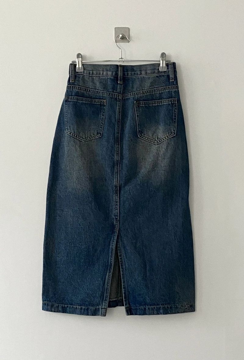 Juana washing long skirt