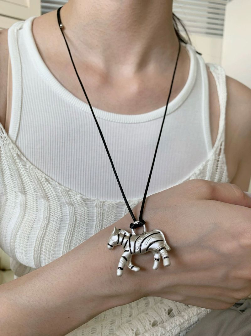 Silver zebra long necklace