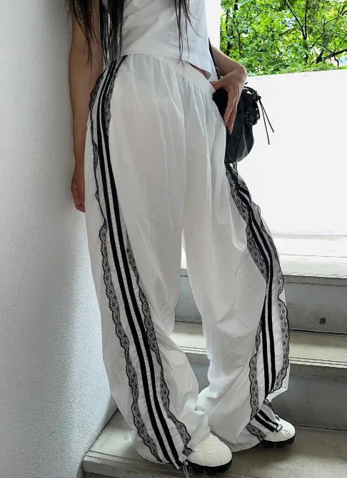 SIAOSIKO（シアオシコ）の「ナイロンレースアップトラックパンツ [2 Colors]（パンツ）」