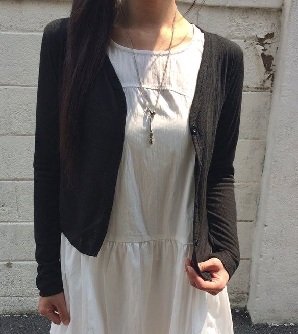 anyonemore（エニーワンモアー）の「Russo See-Through Ribbed Button Cardigan（Tops）」