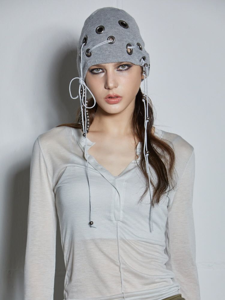 EYELET BEANIE