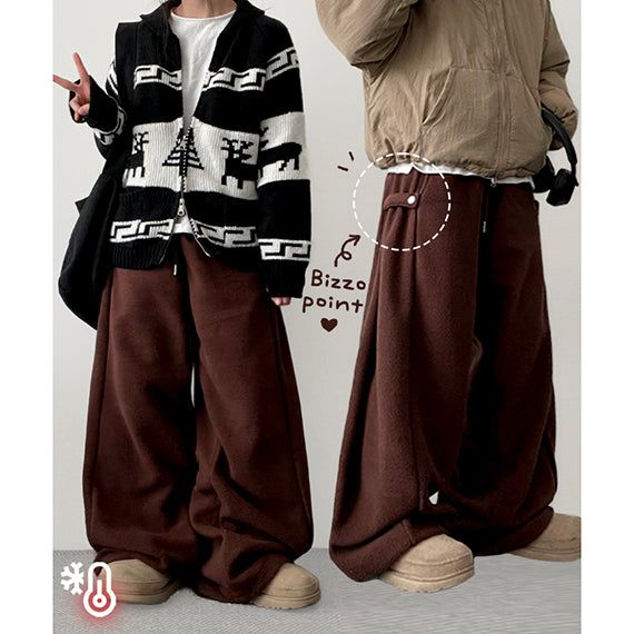 hijjoo（ハイチュー）の「Tizzle pin tuck snap fastener fleece wide pants（Pants）」