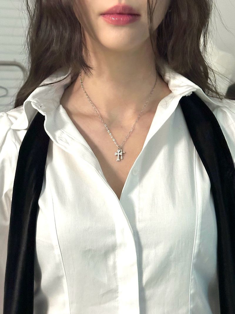 24 winter - cubic cross necklace