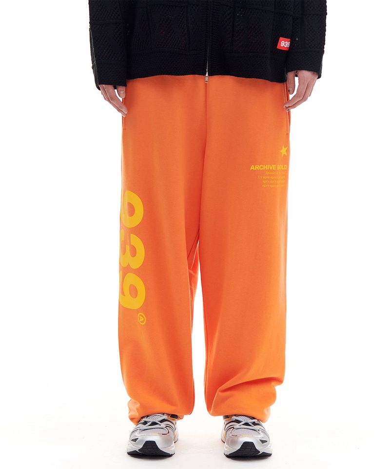ARCHIVE BOLD（アーカイブボールド）の「939 ロゴスウェットパンツ (ORANGE)（パンツ）」