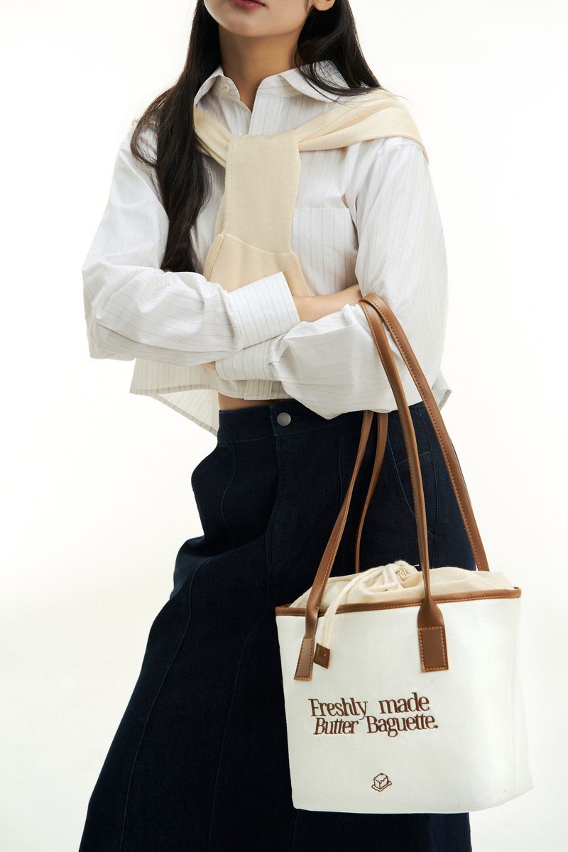 Butter Club（バタークラブ）の「Butter Club BAGUETTE Canvas Tote Bag Drawstring 13 Inch Laptop Multi Colours（Bags）」