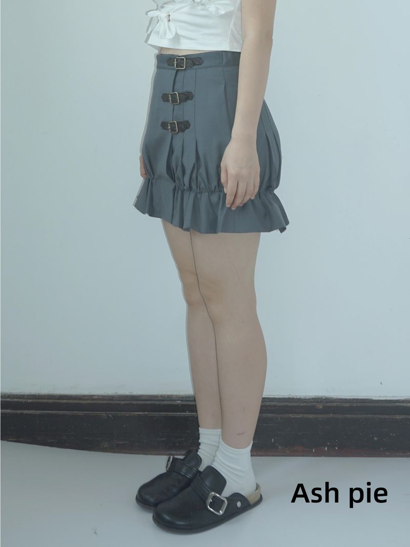Smocked mini skirt with adjustable buckle