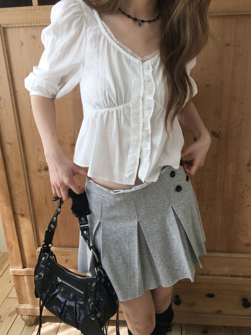 Low pleated sweat mini skirt