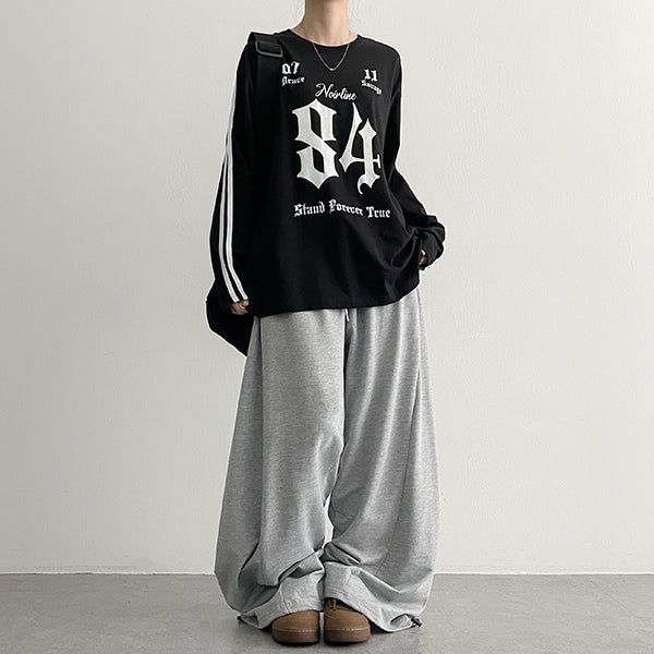 hijjoo（ハイチュー）の「Graphic Long Sleeve Stand 84 Street Long Sleeve T-shirt (3 colors)（Tops）」