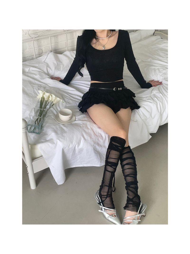 Strap mesh leg warmer