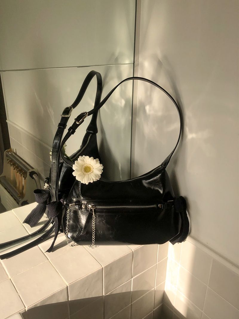ovuni(オーブニ)の「Belted ribbon bag_black(Bags)」