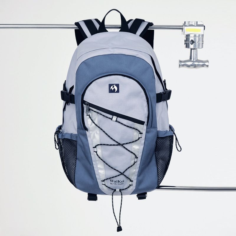 Reflective string backpack