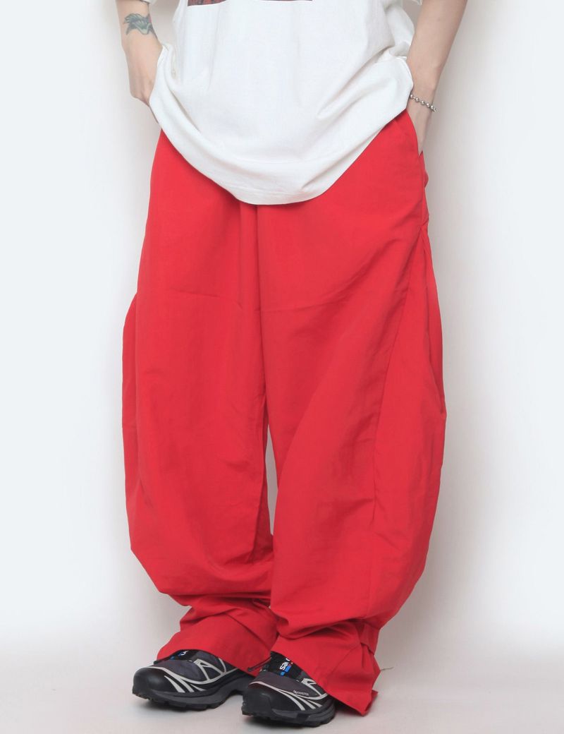 nutellike(ヌテールライク)の「nylon hem snap pants(Pants)」