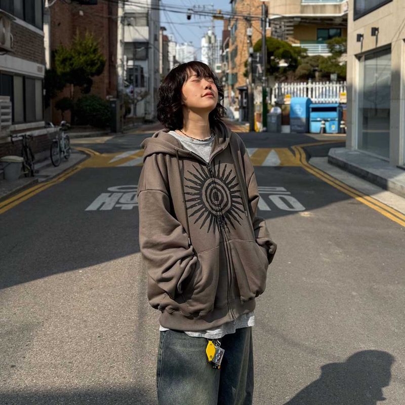 HundoP(ハンドピー)の「Oversized Vintage Sun Hoodie Zip-Up(Tops)」