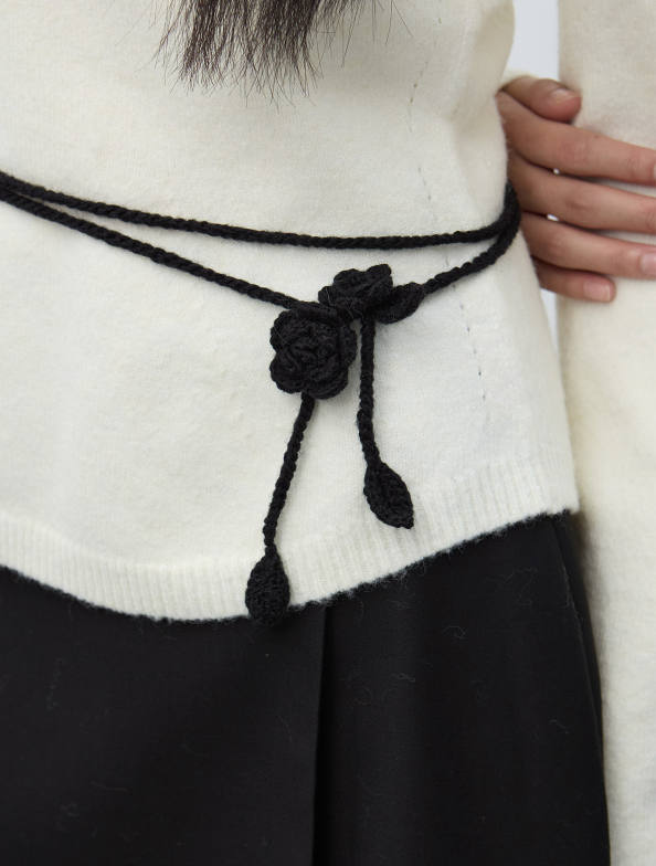 GENERAL IDEA（ジェネラルアイディア）の「handmade knit flower strap - black   （Accessories）」