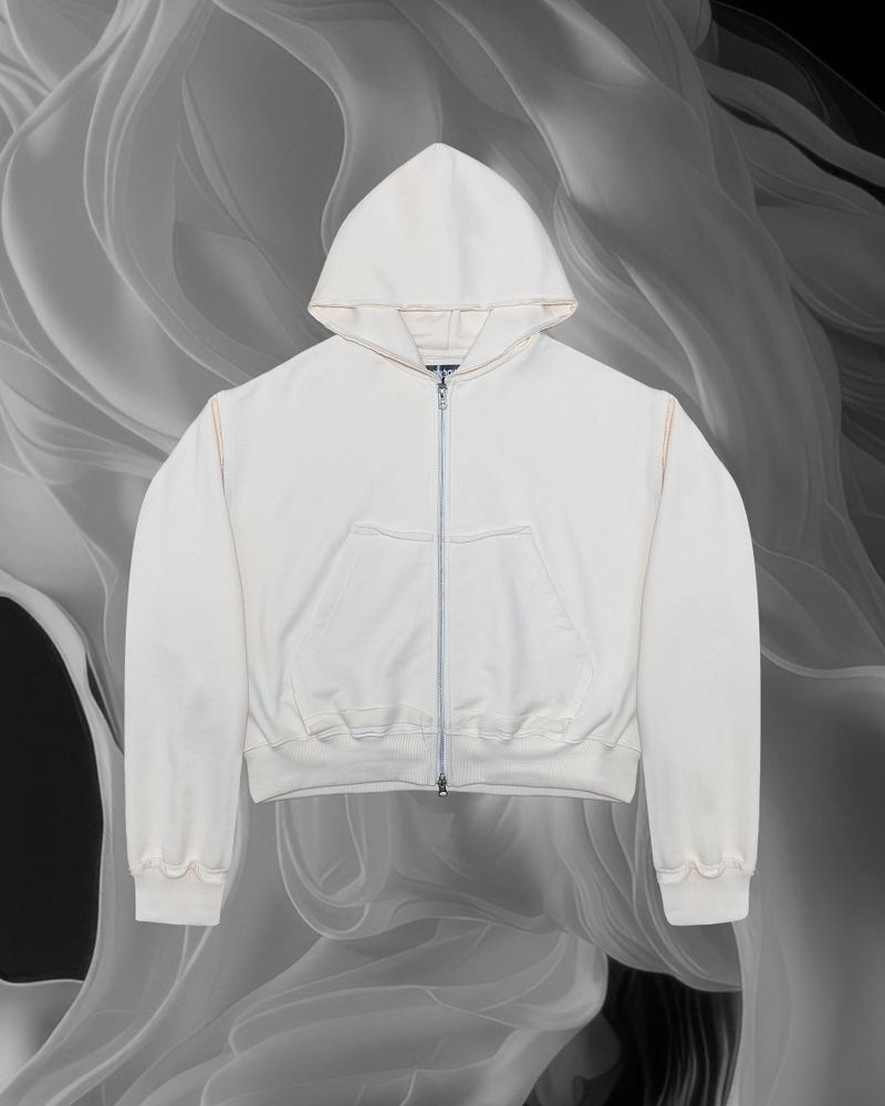 ANDEND(エンデンド)の「CUTTING CROP HOODIE ZIPUP_CREAM(Tops)」