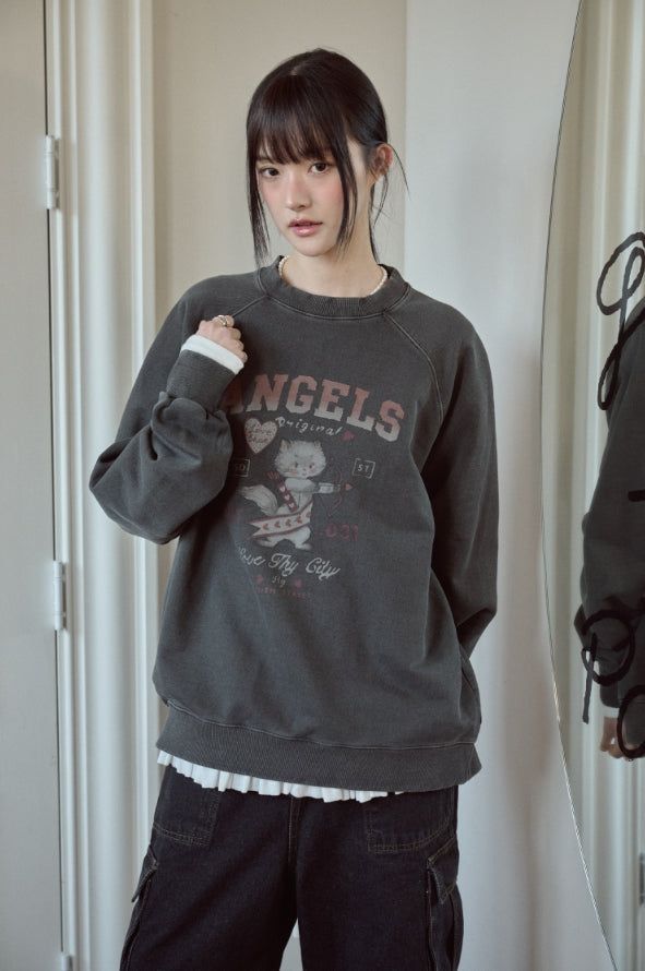 CPGN studio（コンパーニョ）の「Cupid Cat Raglan Pigment Sweatshirt（Tops）」
