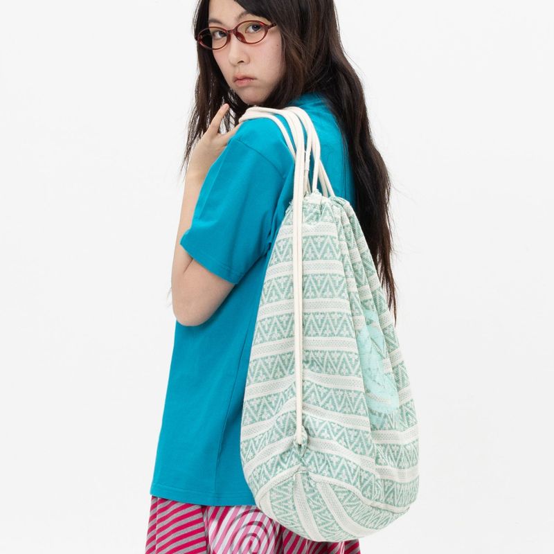 WEBHOUSE（ウェブハウス）の「Twister Ethnic String Bag - Green（Bags）」