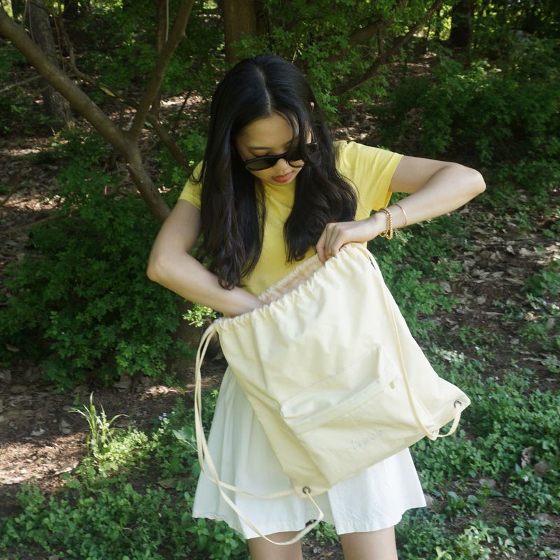logo nylon string backpack_yellow