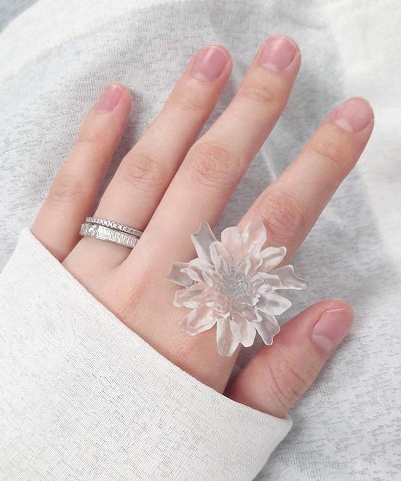 translucent white flower ring