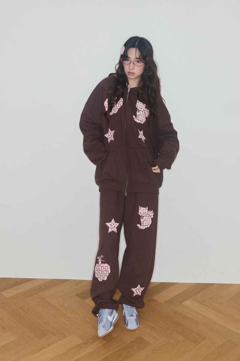 SHAKIRI（シャキリ）の「KIRING CHECK PATCH SWEAT PANTS (BROWN)（Pants）」