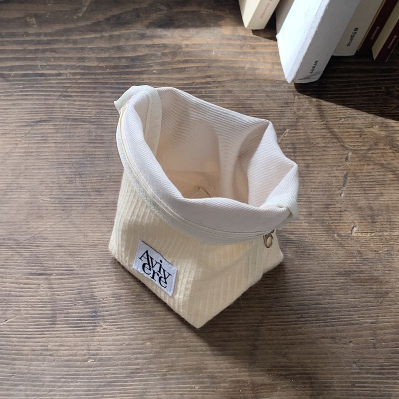 classic pouch_stripe handle yellow