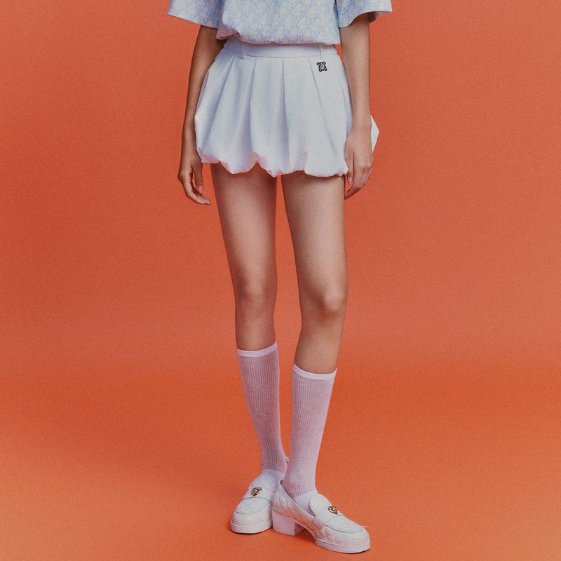DVRK（ダーク）の「DVRK PRIVÉ PLEATED BUBBLE HEM MINI SKIRT - WHITE（Skirts）」