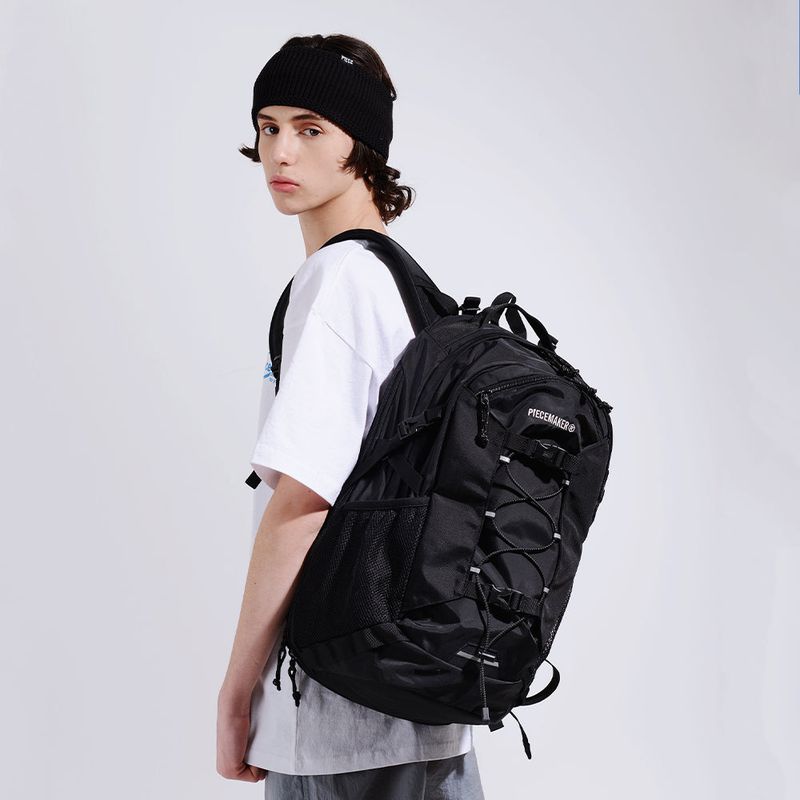 PIECEMAKER(ピースメーカー)の「STRING SQ PRO BACKPACK (BLACK)(Bags)」