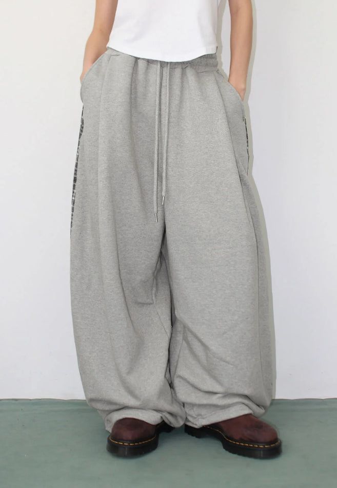 AAKE(アケ)の「CHECK BLOCK SWEATPANTS(Pants)」