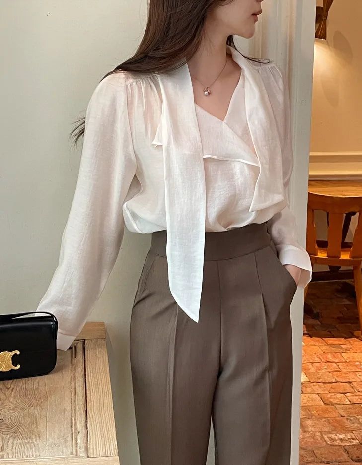 Desha Ruffle Tie Puff Blouse