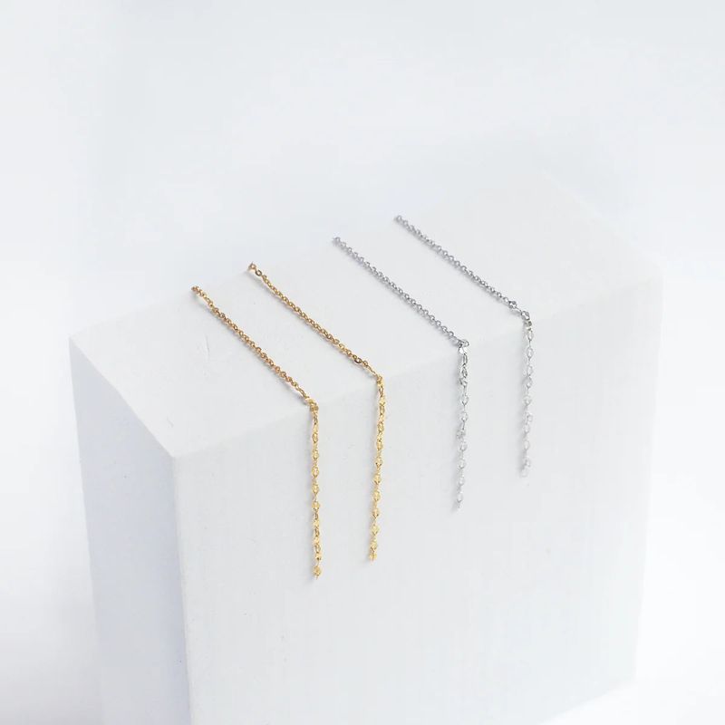 éclater（エクラテ）の「Evon Drop Chain Earrings（Accessories）」