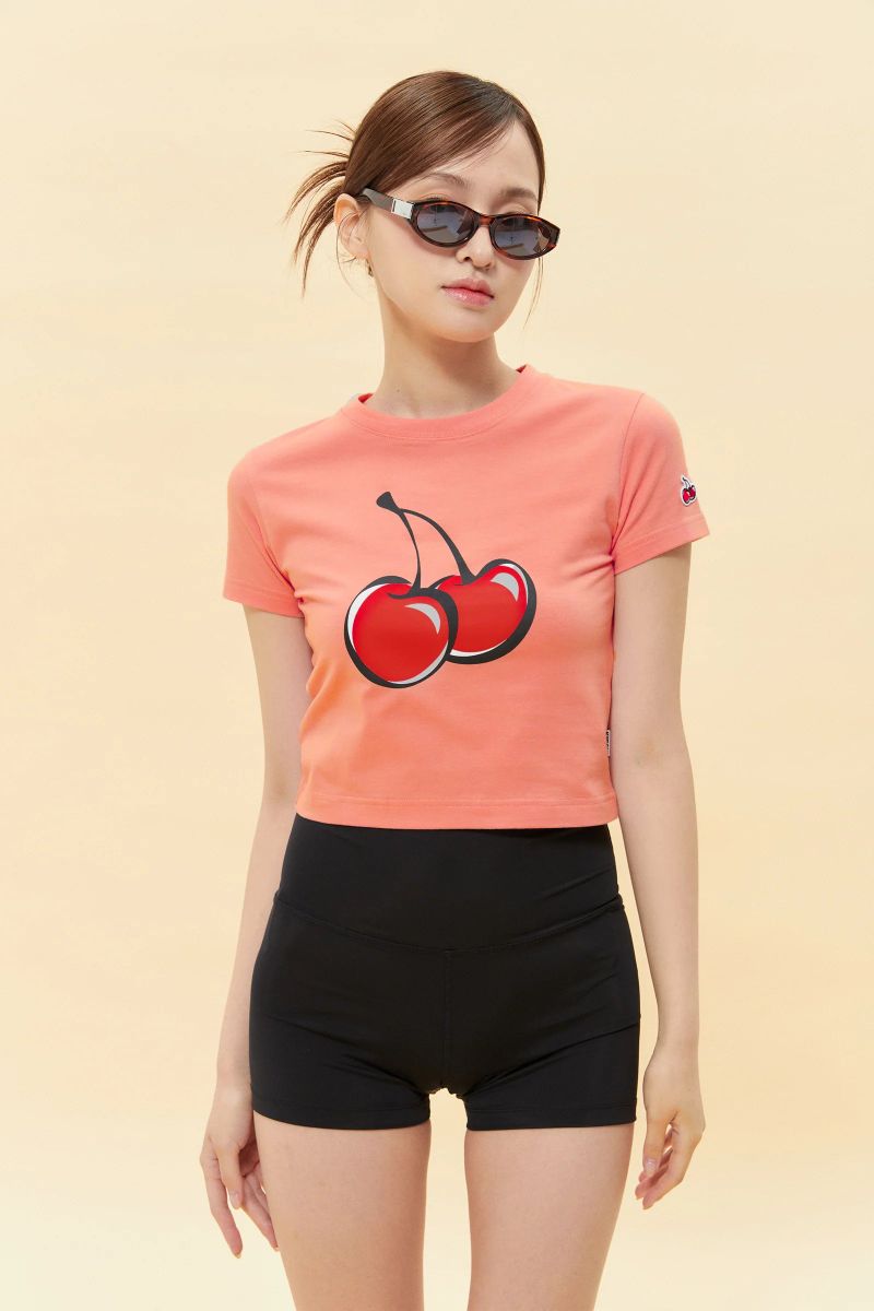 KIRSH（キルシー）の「SIGNATURE BIG CHERRY CROP T-SHIRT - LIGHT ORANGE（Tops）」