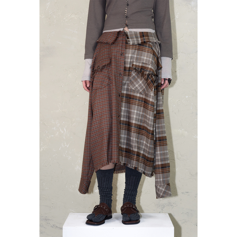 Still Lethardy（スティル レサーディ）の「SLEEVE-OFF CHECK SHIRT-SKIRT（Tops）」