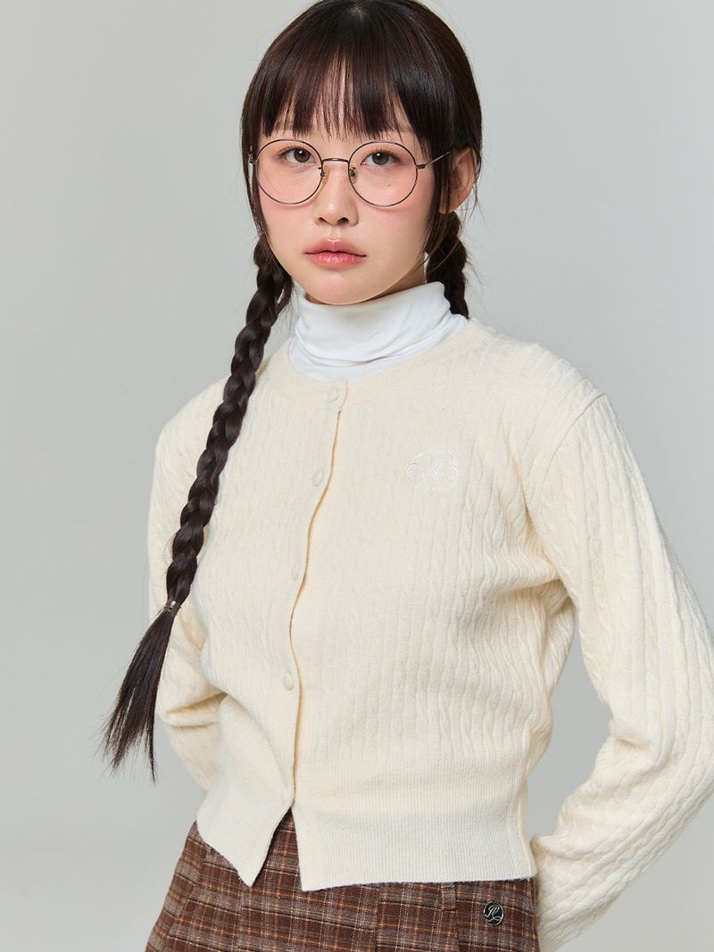 ADORE BELLE(アドールベル)の「EMBROIDERED TWIST CARDIGAN - IVORY(Tops)」