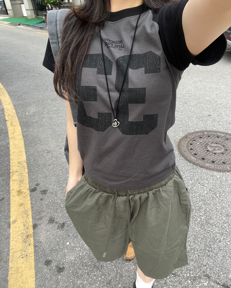 heenytsuki(ヒニツキ)の「Vintage 33 Big Number Raglan T-shirt (Tops)」