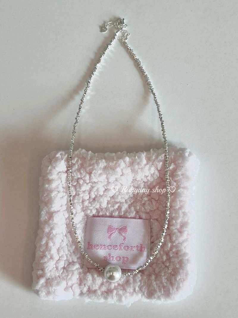 Irregularly shaped silver pearl necklace