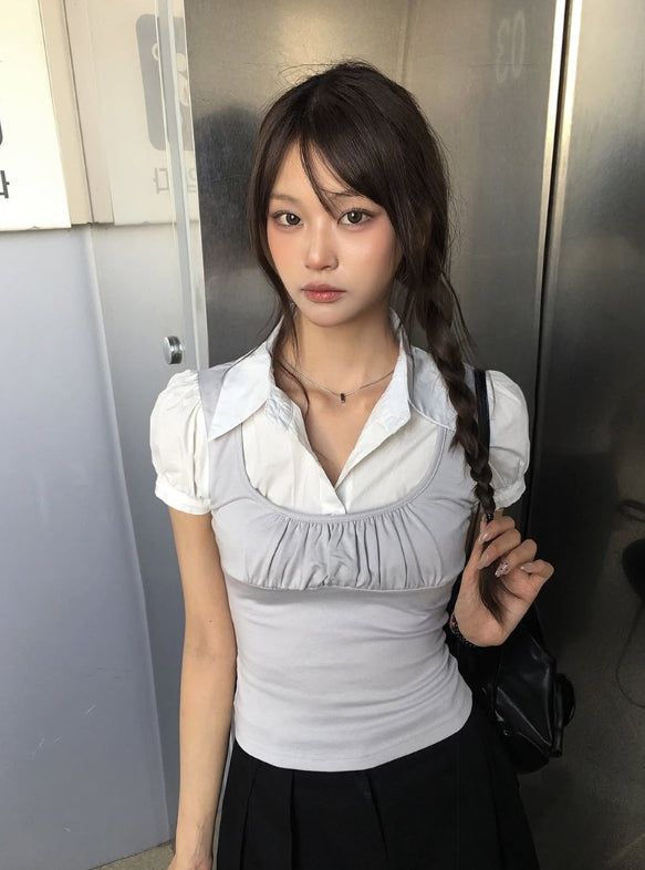 anyonemore（エニーワンモアー）の「Mindum Fake Layered Shirring Bustier Puff Shirt（Tops）」