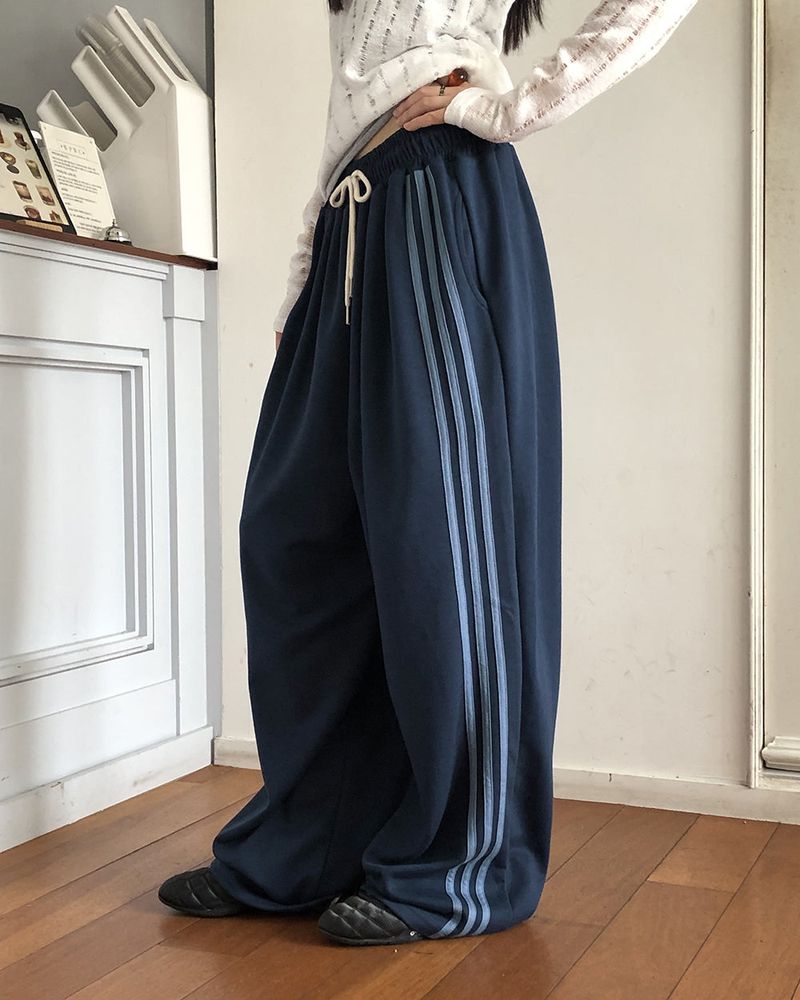 WONDER WONDER(ワンダーワンダー)の「Kinda track snap button wide long sweat pants(Pants)」