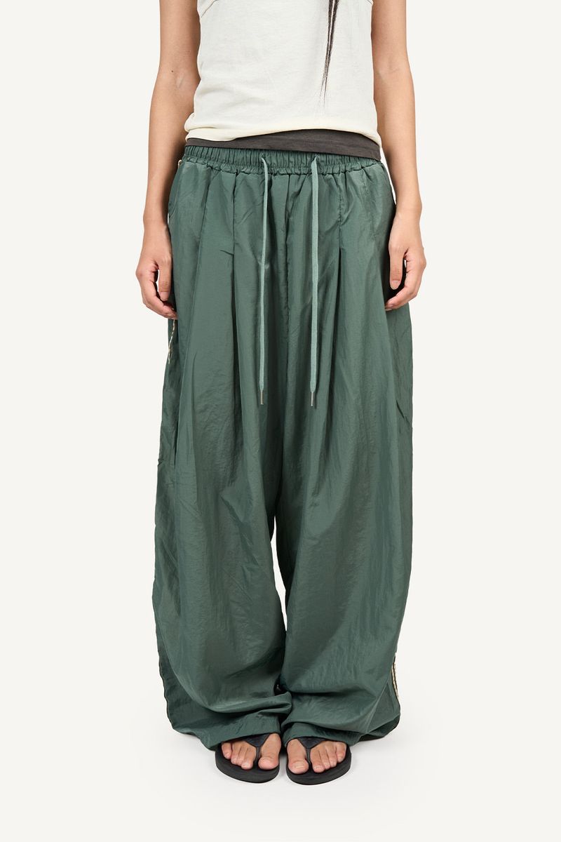 Raucohouse（ラウコハウス）の「Side ethnic nylon pants（Pants）」